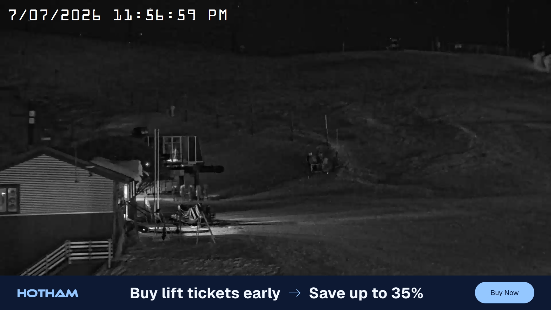 Mt Hotham Summit Trainer snow cam captured at 7 July 2026 at 11:57 pm AEST