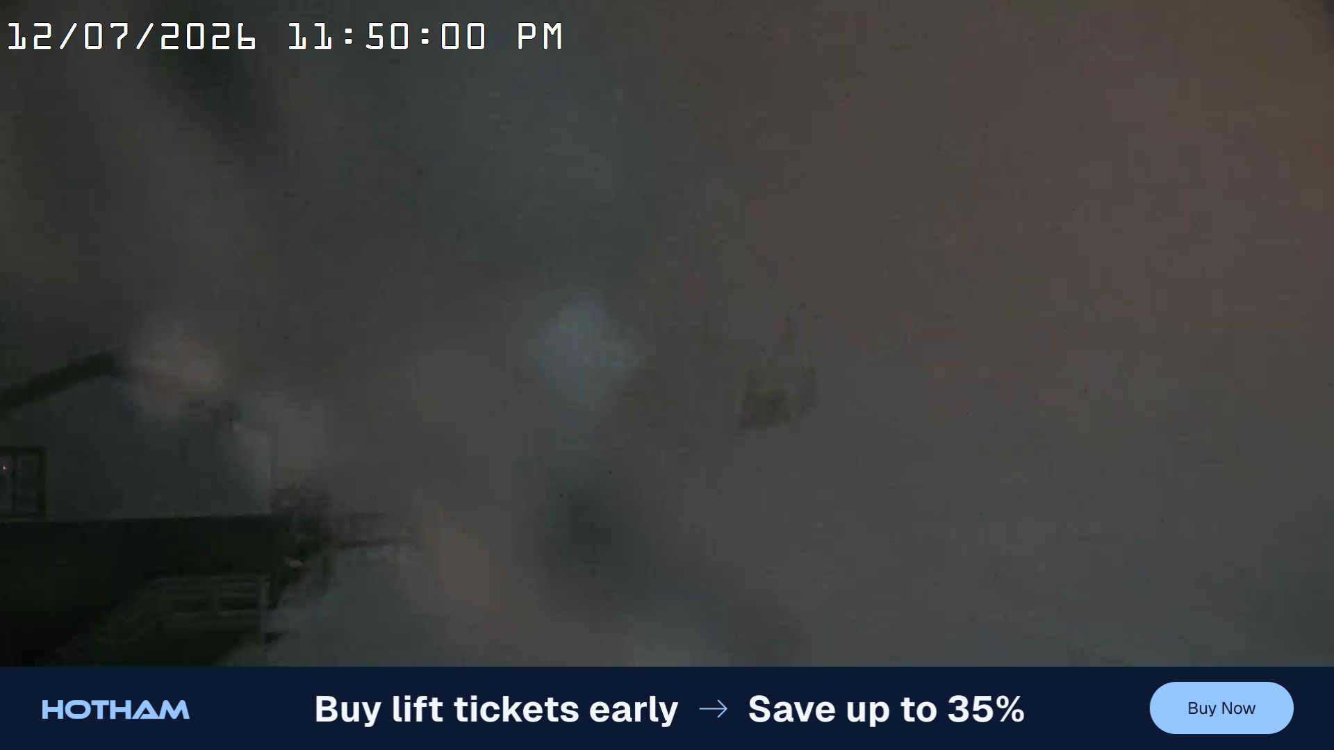 Mt Hotham Summit Trainer snow cam captured at 12 July 2026 at 11:50 pm AEST