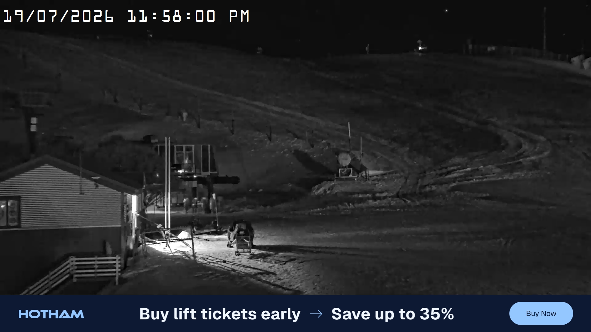 Mt Hotham Summit Trainer snow cam captured at 19 July 2026 at 11:58 pm AEST