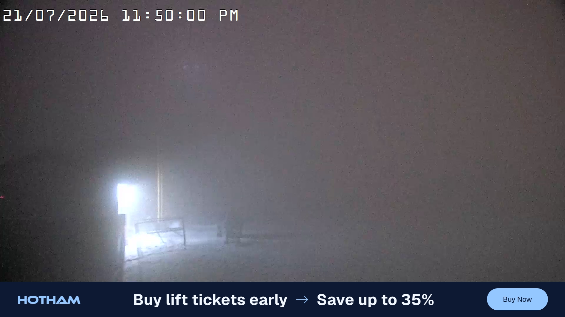 Mt Hotham Summit Trainer snow cam captured at 21 July 2026 at 11:50 pm AEST