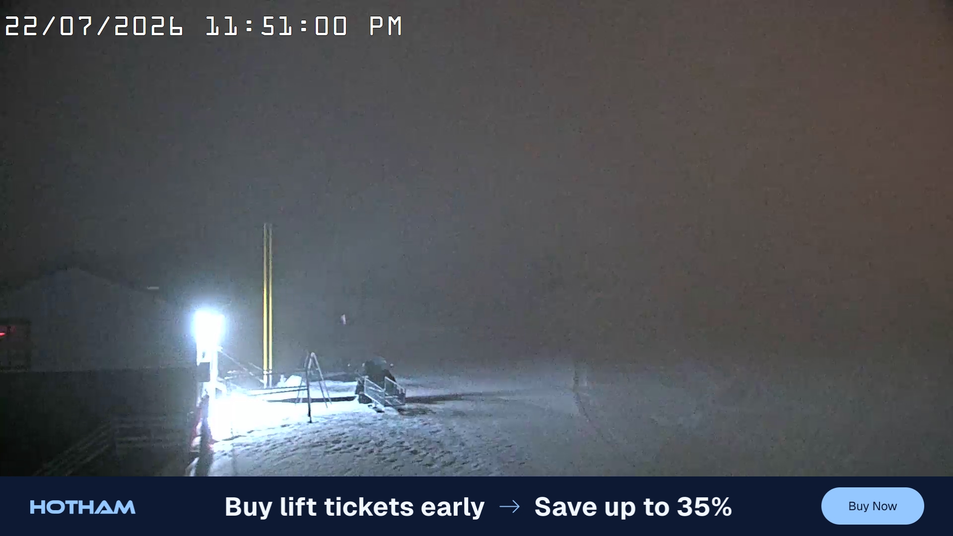 Mt Hotham Summit Trainer snow cam captured at 22 July 2026 at 11:51 pm AEST