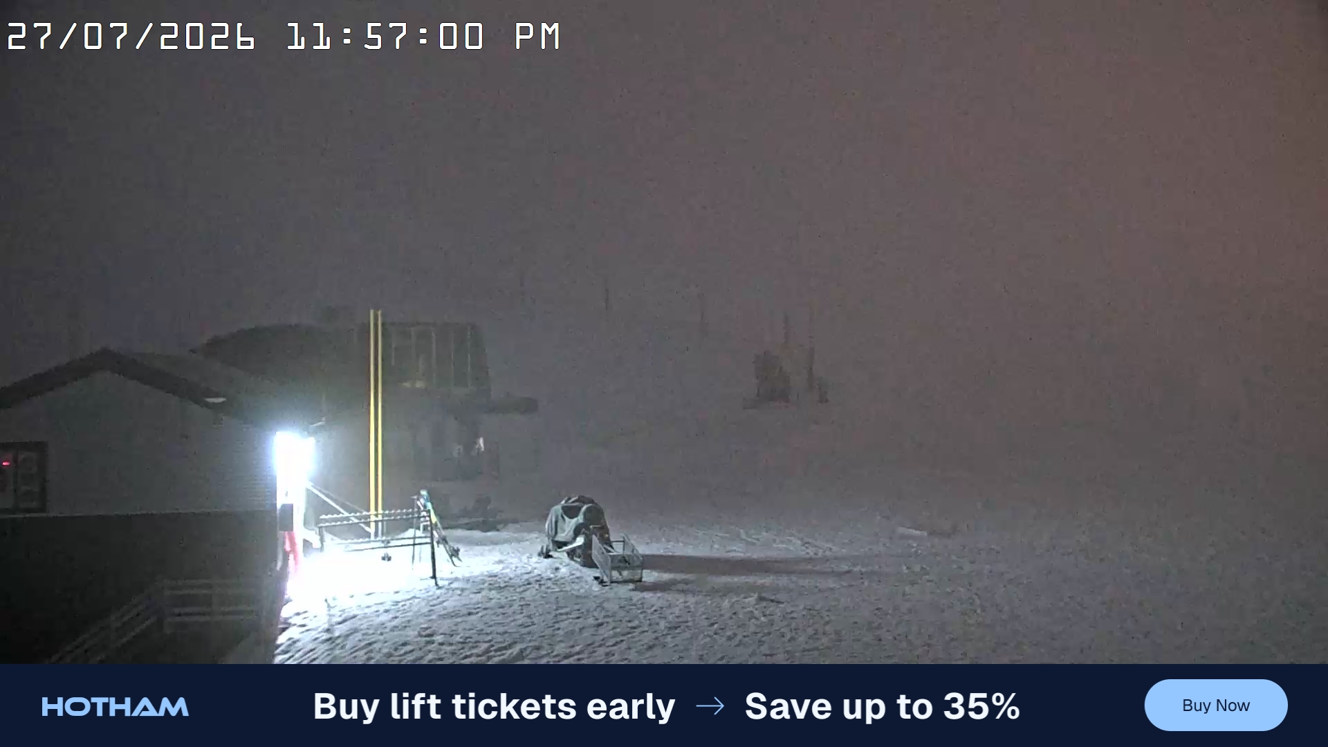 Mt Hotham Summit Trainer snow cam captured at 27 July 2026 at 11:58 pm AEST