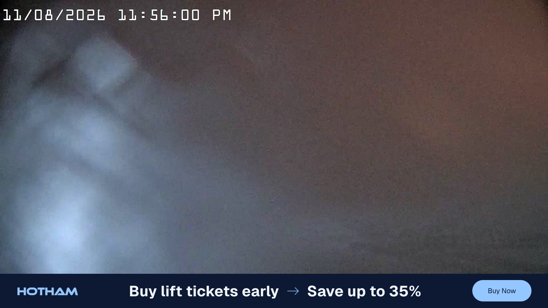 Mt Hotham Summit Trainer snow cam captured at 11 August 2026 at 11:56 pm AEST