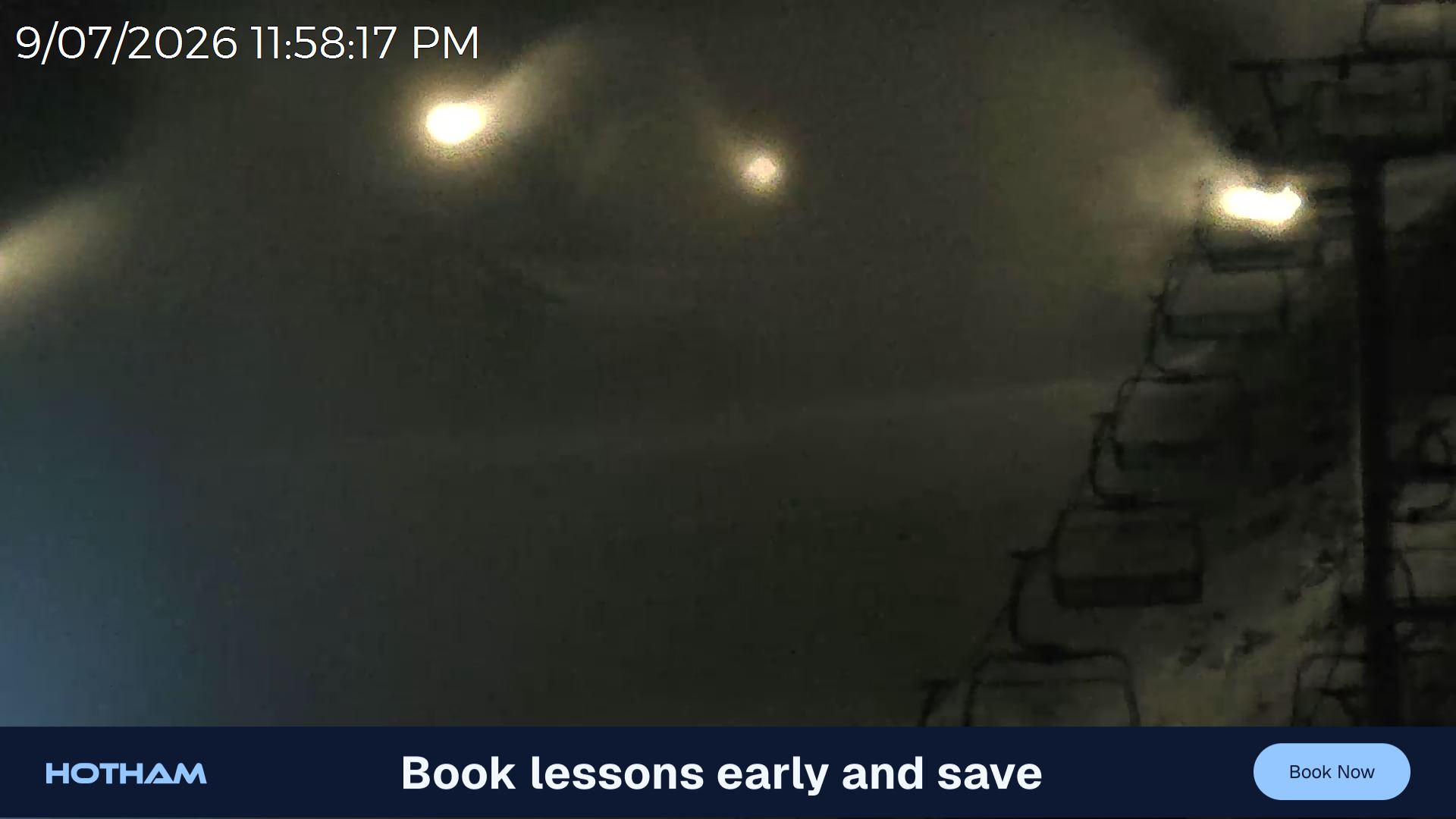 Mt Hotham Slalom Gully snow cam captured at 9 July 2026 at 11:59 pm AEST