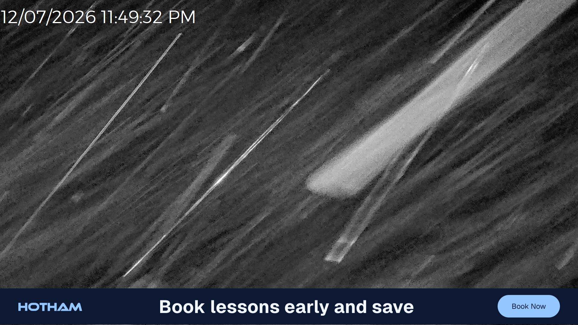 Mt Hotham Slalom Gully snow cam captured at 12 July 2026 at 11:50 pm AEST