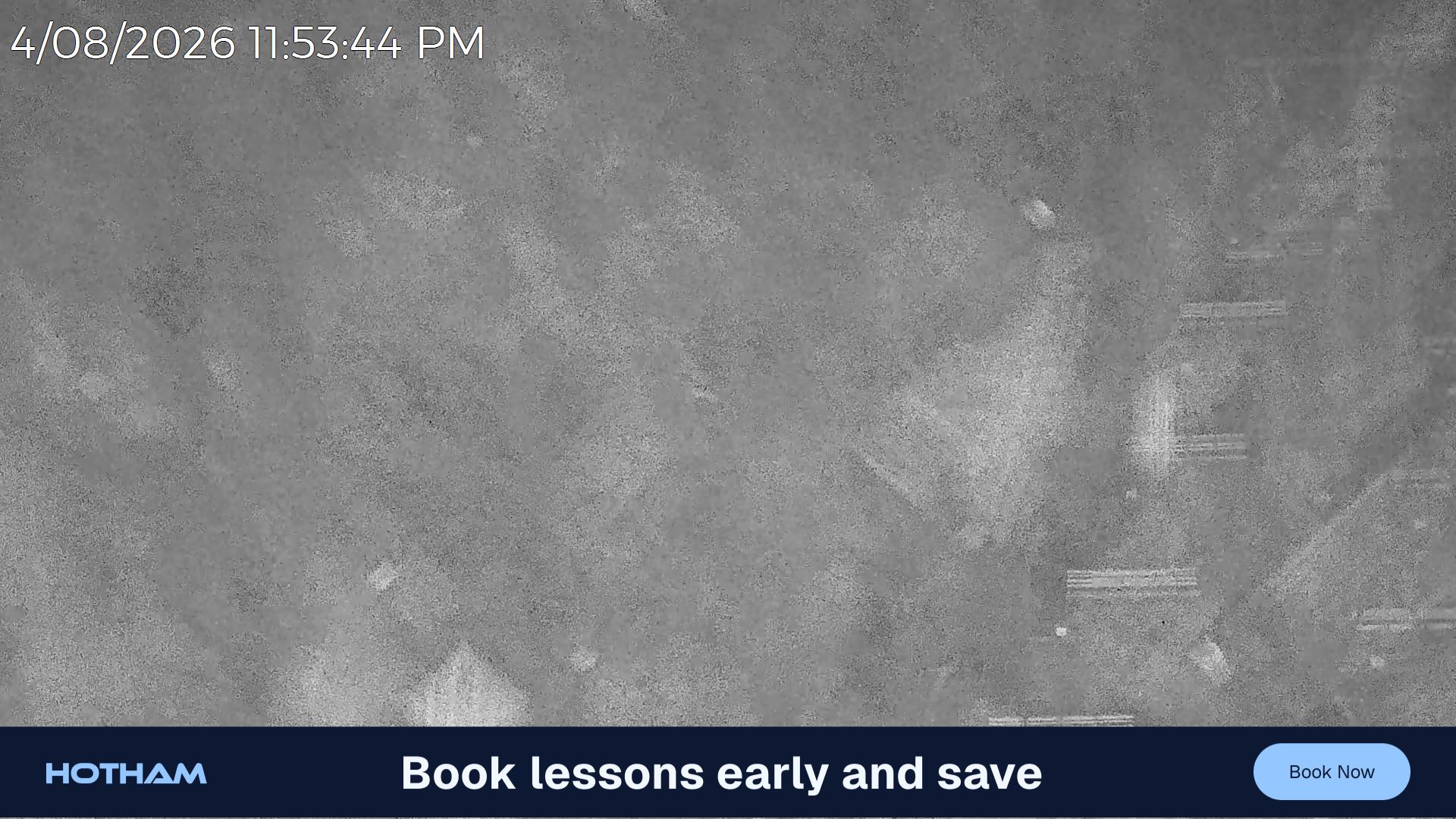 Mt Hotham Slalom Gully snow cam captured at 4 August 2026 at 11:54 pm AEST