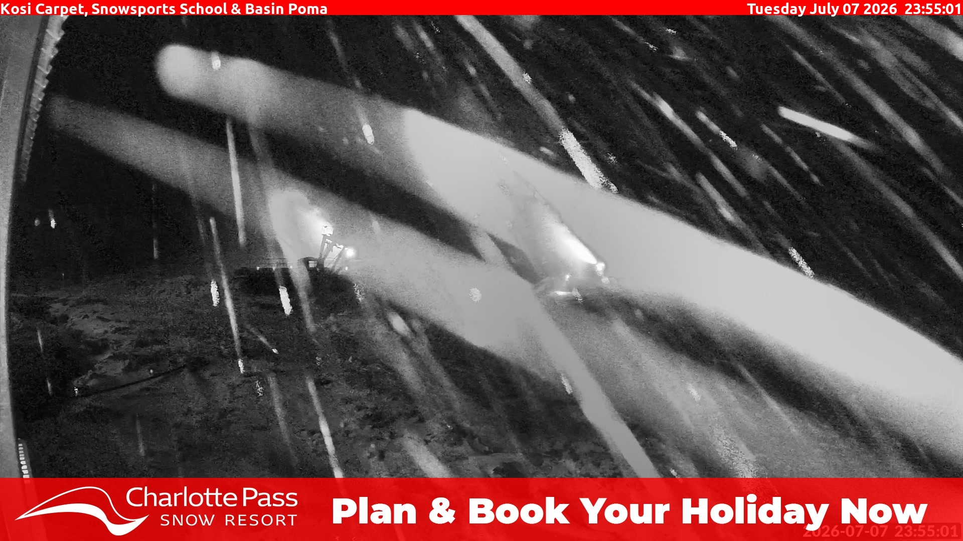 Charlotte Pass Kosi Carpet, Snowsports School and Basin Poma snow cam captured at 7 July 2026 at 11:56 pm AEST