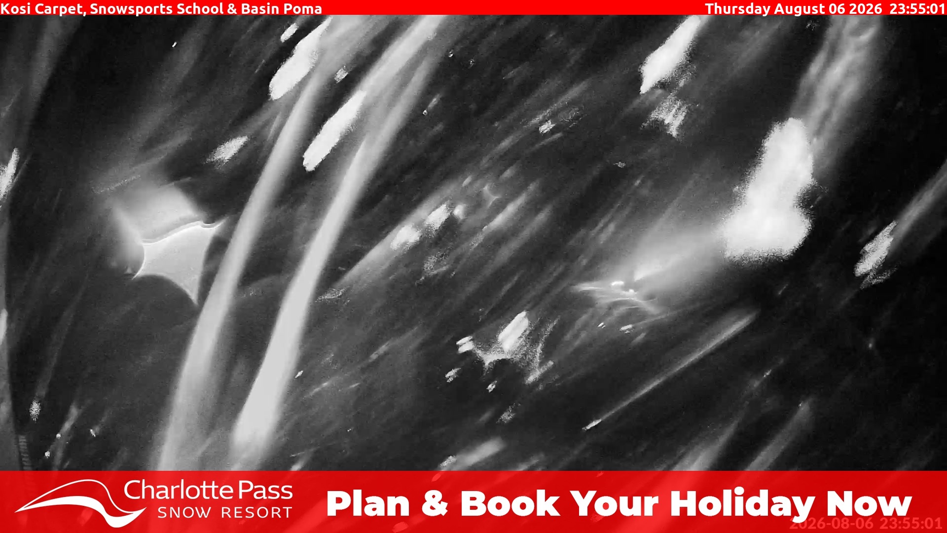 Charlotte Pass Kosi Carpet, Snowsports School and Basin Poma snow cam captured at 6 August 2026 at 11:59 pm AEST
