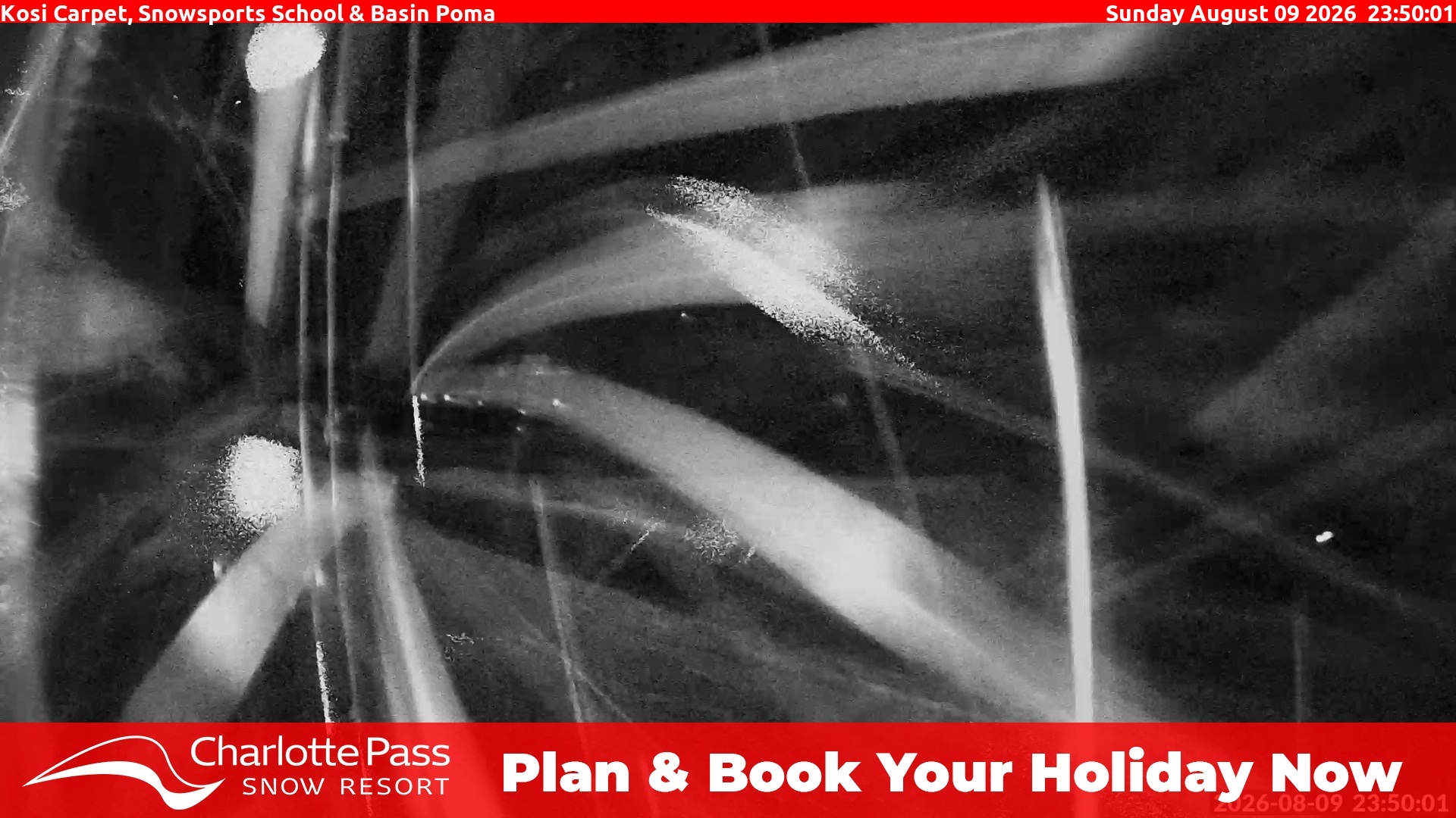 Charlotte Pass Kosi Carpet, Snowsports School and Basin Poma snow cam captured at 9 August 2026 at 11:51 pm AEST