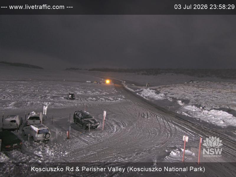 Perisher Perisher Valley Car Park Road snow cam captured at 3 July 2026 at 11:58 pm AEST