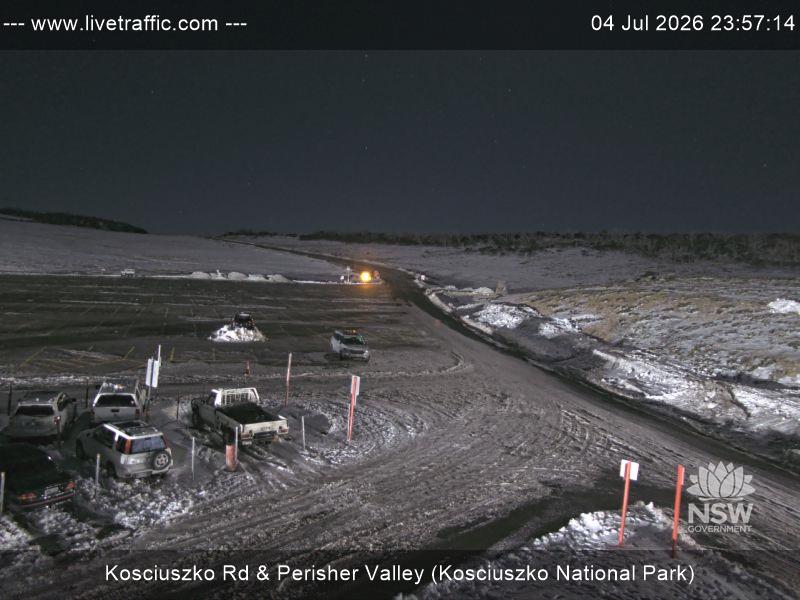 Perisher Perisher Valley Car Park Road snow cam captured at 4 July 2026 at 11:57 pm AEST