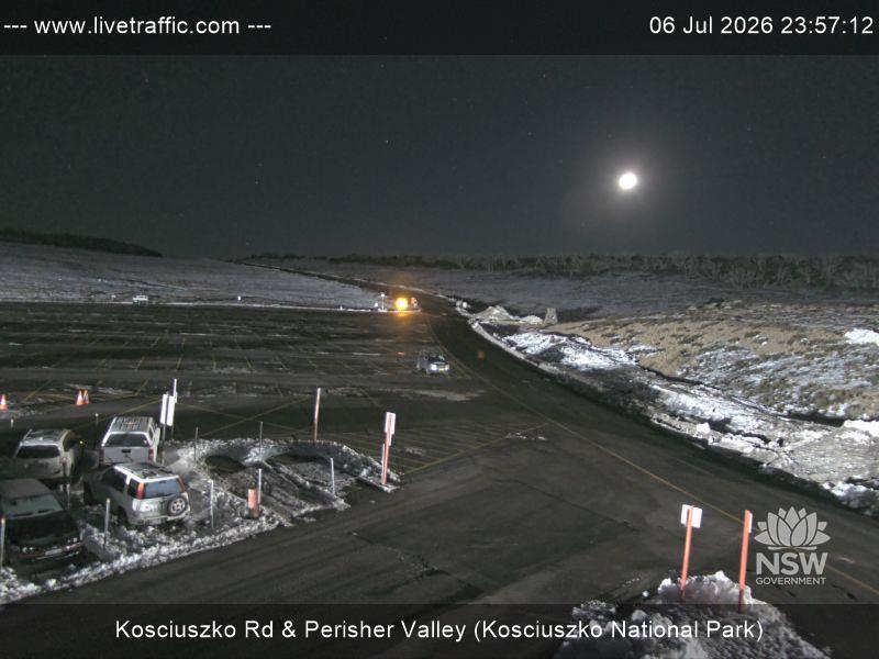 Perisher Perisher Valley Car Park Road snow cam captured at 6 July 2026 at 11:57 pm AEST