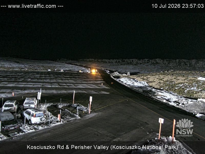Perisher Perisher Valley Car Park Road snow cam captured at 10 July 2026 at 11:57 pm AEST