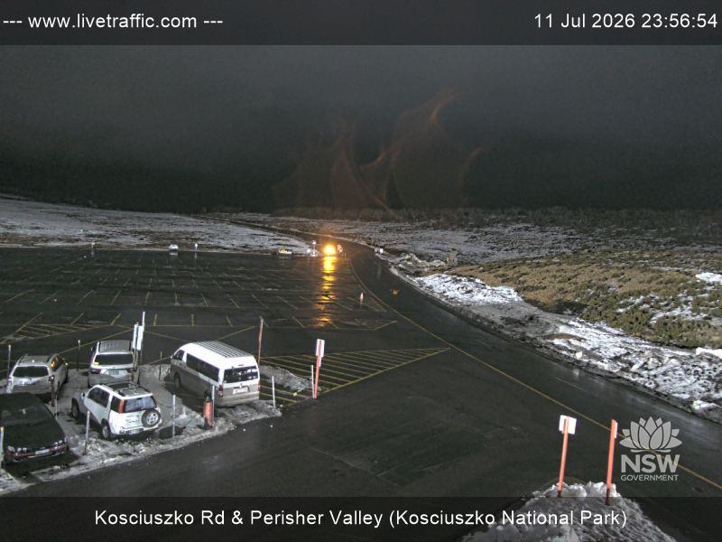 Perisher Perisher Valley Car Park Road snow cam captured at 11 July 2026 at 11:56 pm AEST