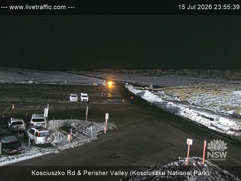 Perisher Perisher Valley Car Park Road snow cam captured at 15 July 2026 at 11:55 pm AEST