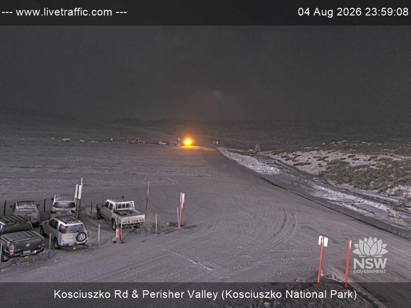 Perisher Perisher Valley Car Park Road snow cam captured at 4 August 2026 at 11:59 pm AEST