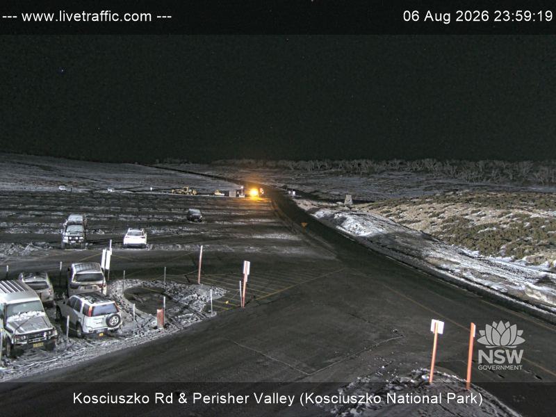 Perisher Perisher Valley Car Park Road snow cam captured at 6 August 2026 at 11:59 pm AEST