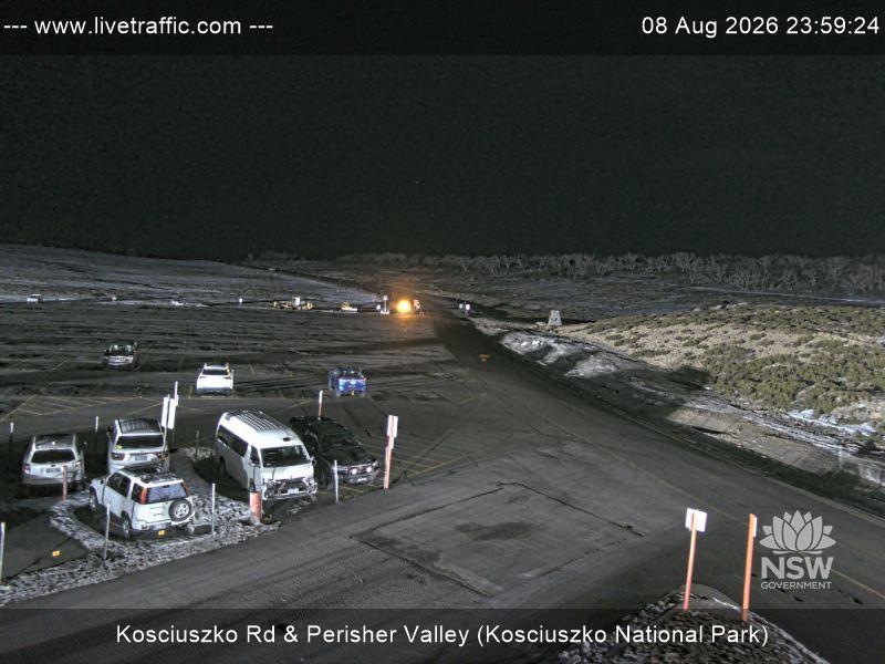 Perisher Perisher Valley Car Park Road snow cam captured at 8 August 2026 at 11:59 pm AEST