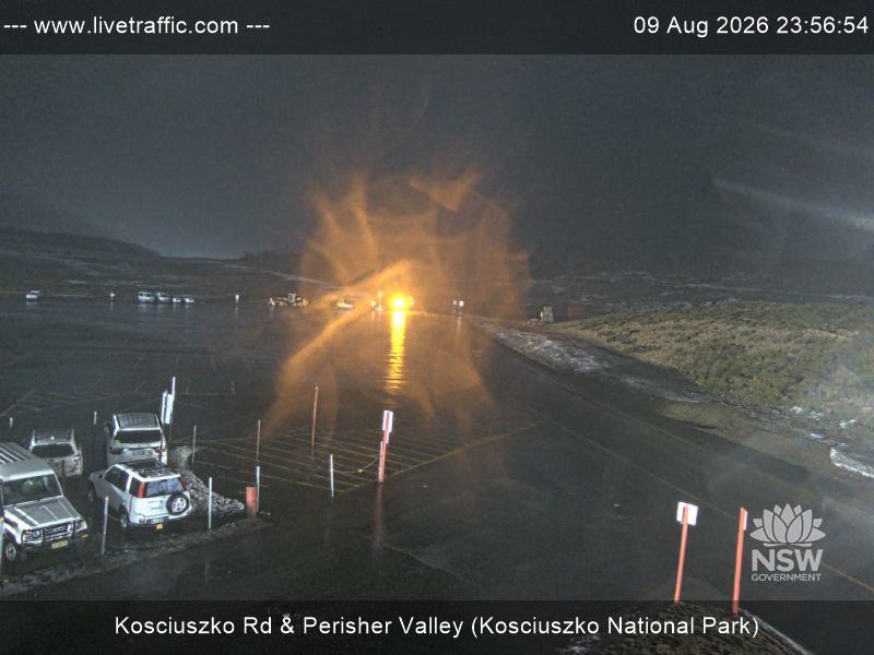 Perisher Perisher Valley Car Park Road snow cam captured at 9 August 2026 at 11:56 pm AEST