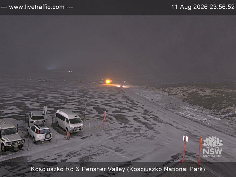 Perisher Perisher Valley Car Park Road snow cam captured at 11 August 2026 at 11:56 pm AEST