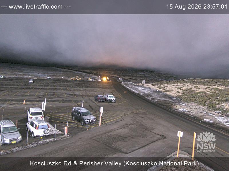 Perisher Perisher Valley Car Park Road snow cam captured at 15 August 2026 at 11:57 pm AEST